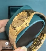 Composition of the case and clasp together, showing how the integrated bracelet flows into the case design.