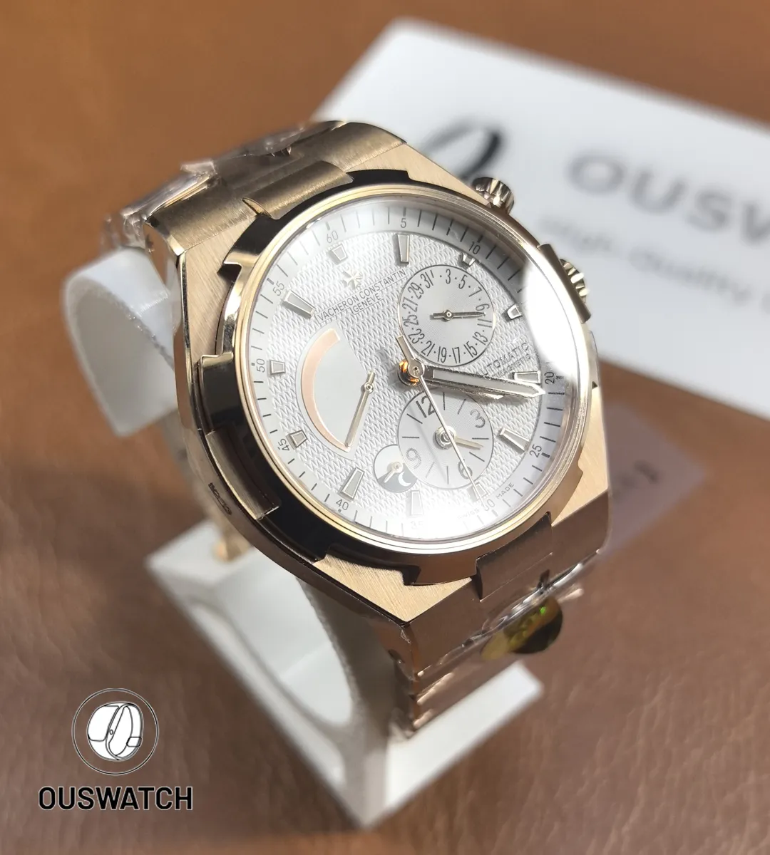 Overseas dual time mounted on a display stand, styled to show proportions and presentation quality.