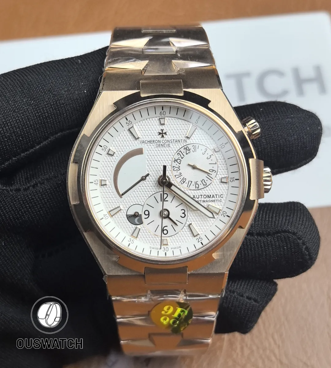 Straight-on view of the Overseas dual time with white dial, highlighting the secondary time subdial and applied markers.