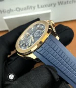 Blue composite rubber strap of the Aquanaut 5261R-001, featuring embossed checker pattern and smooth integration with the rose gold case.