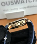 Front view macro of the Aquanaut 5261R-001 crown with Calatrava cross engraving, revealing polished finishing and functional detail.