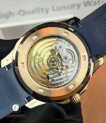 Transparent sapphire caseback of the Aquanaut 5261R-001, displaying the self-winding mechanical movement with decorated rotor and Geneva striping.
