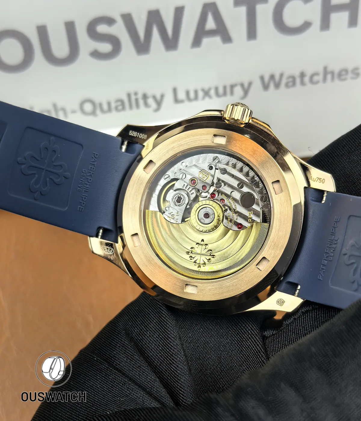 Rear panoramic view of the Aquanaut 5261R-001, revealing the exhibition sapphire back, visible rotor, and engraved case markings.