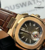 Angled view of the Nautilus 5980R 18k rose gold case at 45 degrees, showing the contrast between polished and brushed finishing.