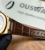 Close-up of the Nautilus 5980R alligator leather strap, highlighting the grain texture, stitching, and integration with the rose gold clasp.