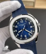 Patek Philippe Aquanaut 5168G-001 captured at a 110-degree angle, emphasizing the domed sapphire crystal and depth of the blue dial under light.