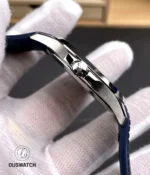 Detailed macro of the Patek Philippe Aquanaut 5168G-001 crown and case, showcasing knurled grip texture and polished surface transitions.