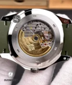 Exhibition caseback view of the Aquanaut 5168G-010 revealing movement finishing, rotor detail and bridge decoration.