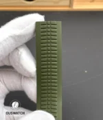 Textured tropical rubber strap for the Aquanaut 5168G-010 laid flat to show grain pattern and endlink fit.