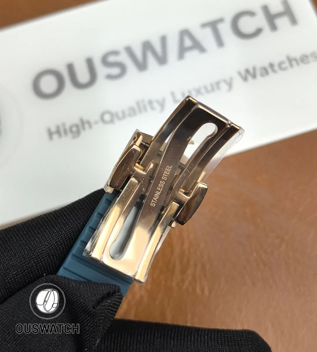 Macro of the 5261R-001 folding clasp in rose gold, revealing stamped markings and hinge construction.