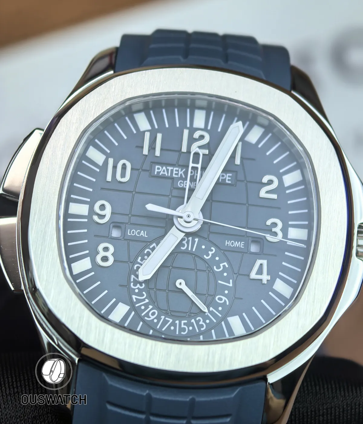 Macro of the blue dial on the 5164G-001 highlighting textured grid pattern, applied markers and handset detail.