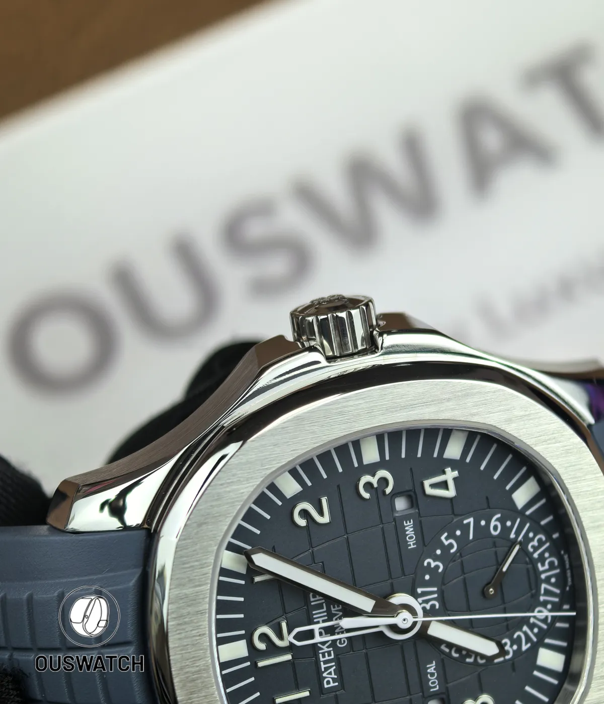 Extreme close-up of the 5164G casework revealing surface texture, polished bevels and machining quality.