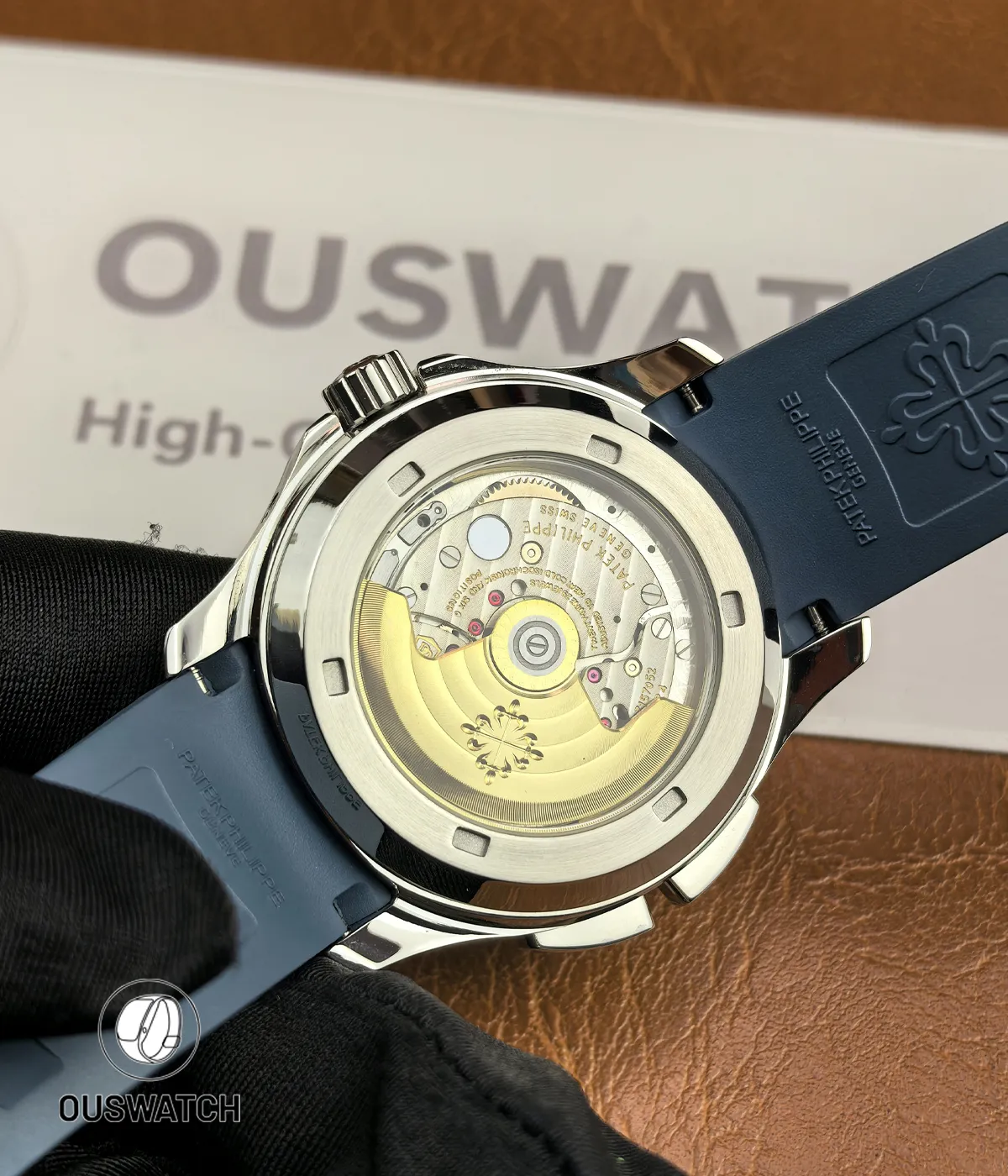 Exhibition caseback view of the 5164G-001 showing the movement architecture, rotor detail and bridge finishing.