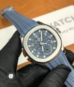 Full composition of the Aquanaut Travel Time 5164G-001 displaying case, bezel and integrated strap in one frame