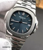 85° front-angle view emphasizing dial relief, applied markers and the refined case finishing of the Nautilus 5711.