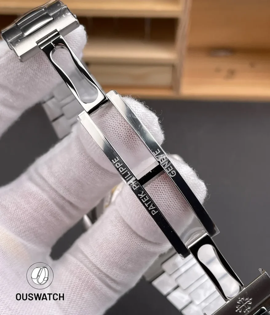 Folded clasp of the Nautilus 5711/1A-010 in stainless steel, highlighting stamped details and secure locking mechanism.