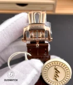 Rose-gold pin buckle for the Nautilus 5712 — tight shot showing pin geometry and engraved branding.