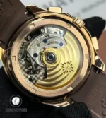 Macro shot of the Patek Philippe Aquanaut 5968R-001 sapphire caseback, revealing the automatic Caliber CH 28-520 C movement with intricate Geneva stripes and gold rotor.