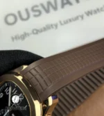 Macro view of the strap connection on the Patek Philippe Aquanaut Chronograph 5968R-001, demonstrating the seamless junction between the composite strap and the sculpted case.