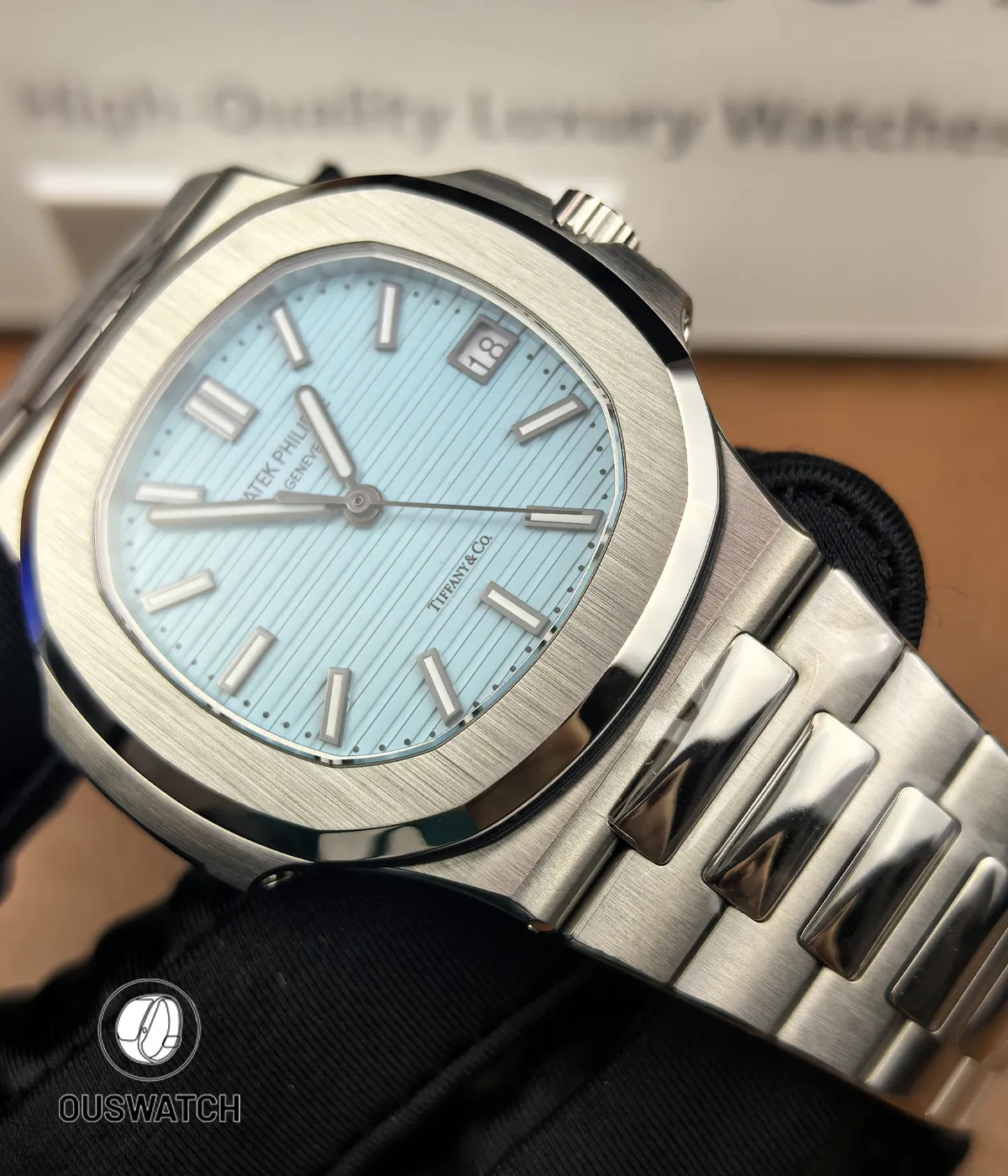 Side view of the Patek Philippe Nautilus 5711/1A-018 Tiffany & Co crown section, showing the thin case profile and expert finishing of the stainless steel edges.