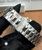 Close-up of the folding clasp of the Patek Philippe Nautilus 5711/1A-018 Tiffany & Co, engraved with the Patek Philippe logo and designed for secure comfort.