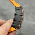 Angled side display of the RM 11-03 carbon case that highlights the striated carbon texture and sculpted caseband.