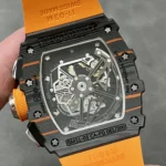 Exhibition caseback view of the RM 11-03 McLaren yellow chronograph, revealing the decorated automatic movement and rotor engraving.