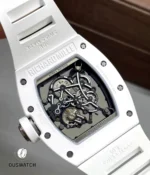 Extreme macro of the RM055 movement showing gear train, balance wheel and skeleton bridge finishing.