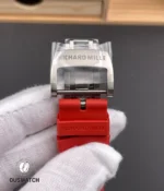 Macro close-up of the RM 055 Bubba Watson red watch clasp with engraved logo and polished metal finish.