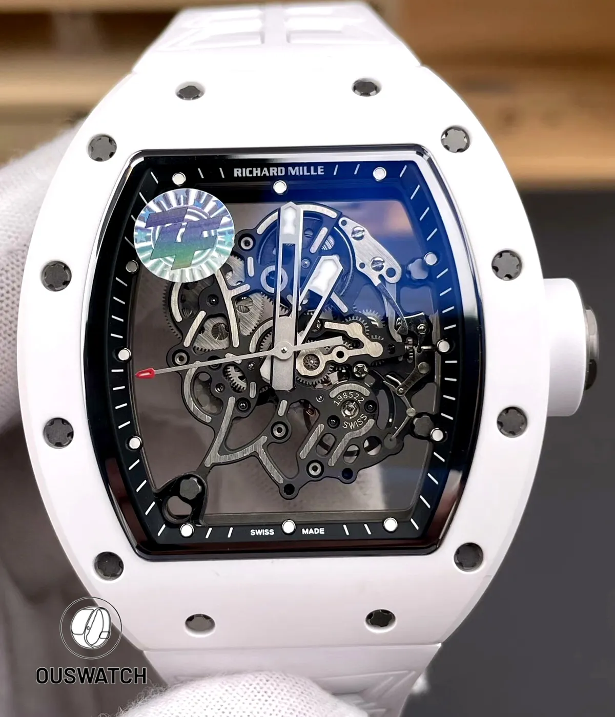 Front portrait of the RM055 Bubba Watson with white ceramic case, revealing the skeletonized dial architecture and bold handset