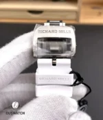 Stainless steel pin buckle for the RM055 displayed in macro, highlighting the pin geometry and branded engraving.