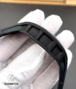 Side composition showing the Carbon NTPT case texture and layered composite pattern of the RM 055 White Legend.