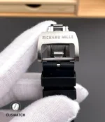 Macro detail of the stainless-steel clasp for the RM 055 White Legend, highlighting hinge construction and finish.