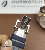 Folding clasp in stainless steel presented closed — a view that emphasizes construction solidity and discreet branding.