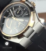 Tight macro of the case-to-lug junction on the 47450 two-tone, showing precise link fitment and chamfer detail.