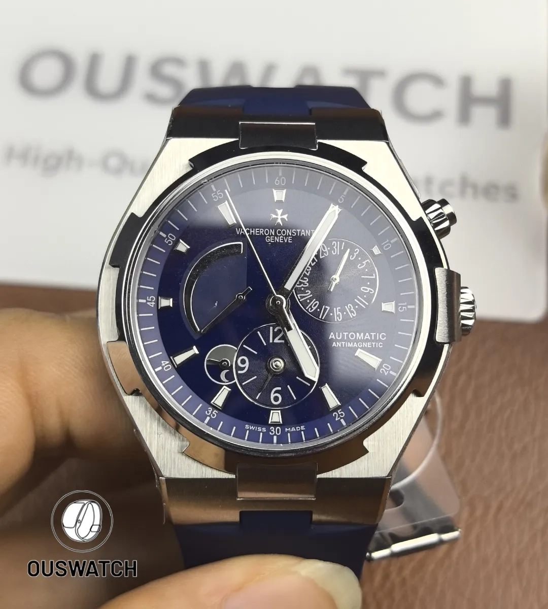 Straight-on composition of the Overseas dual time showcasing the secondary time indicator and clean dial geometry.