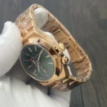 Macro of the case and signed crown on the 7920V, revealing knurling and crown-tube finishing.