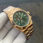 Close-up of the rose-gold bezel showing polished facets and how it frames the green dial.