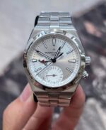 Vacheron OAverseas Dual Time 7900V/110A-B333 stainless steel replica — straight-on portrait showing the dual-time layout and clean silver dial.