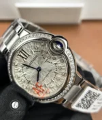 Detailed view of the silver diamond dial alongside the pavé-set diamond bezel on the Ballon Bleu 33mm.