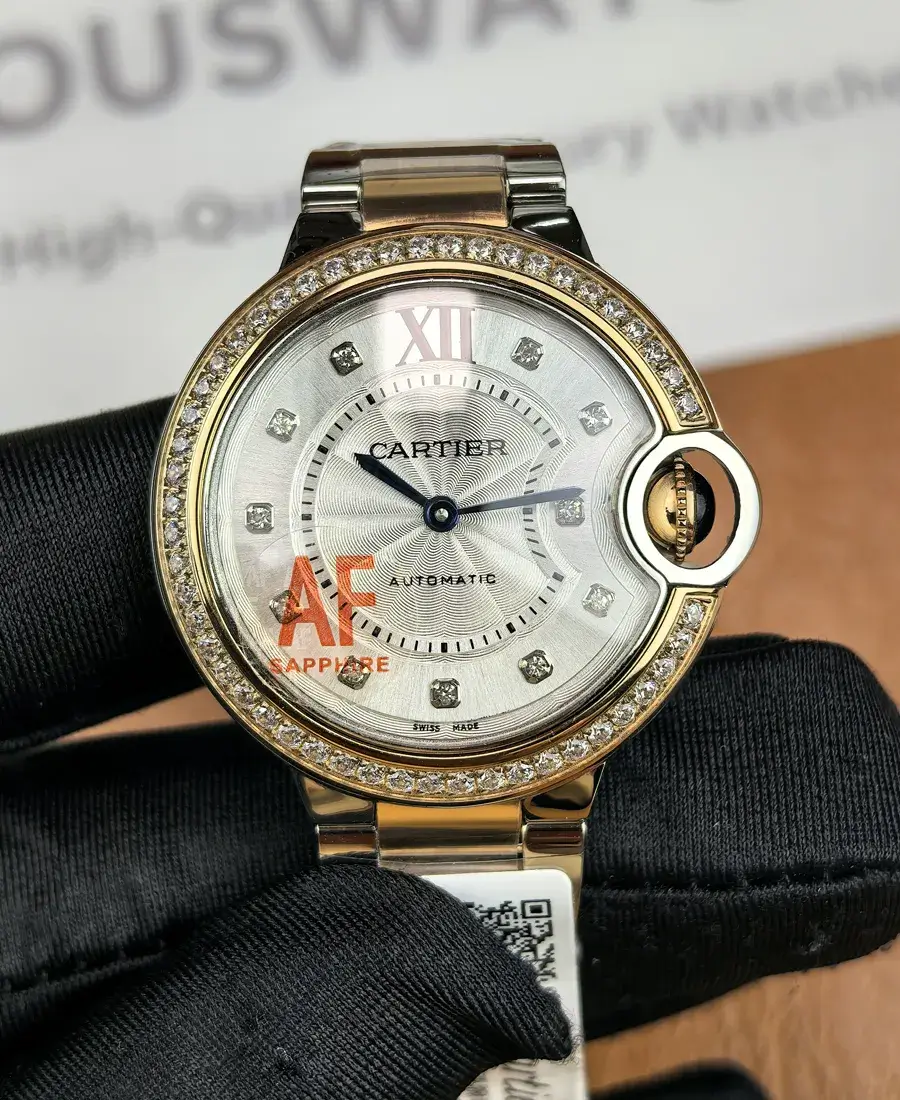 Front view of Cartier Iced Out Ballon Bleu 33mm ladies watch with diamond-set bezel and silver dial.
