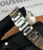 Close-up detail of the bracelet links and finishing on the Cartier Iced Out Ballon Bleu 33mm.