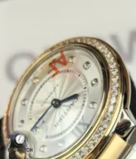 Detailed close-up of the rose gold, diamond-set bezel on the Cartier Iced Out Ballon Bleu 33mm.