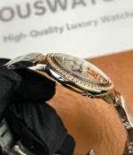 Close-up of the satin-brushed finish on the case side of the Cartier Iced Out Ballon Bleu 33mm.