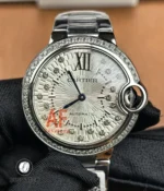 Front view of Cartier Iced Out Ballon Bleu 33mm automatic watch with silver diamond-set dial and stainless steel case.