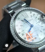 Close-up of the sapphire crystal showing clarity and anti-reflective surface on the Ballon Bleu 33mm.