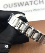 Close-up detail of the stainless steel bracelet links, finish, and clasp on the Ballon Bleu 33mm.