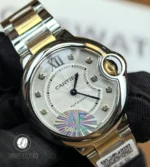 120-degree angled view of the two-tone Ballon Bleu showing the diamond dial, bezel, and bracelet.