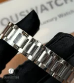 Close-up of the bracelet links highlighting the two-tone finish and polishing.