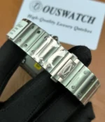 Close-up of the steel bracelet on the Cartier Santos Green Dial WSSA0062